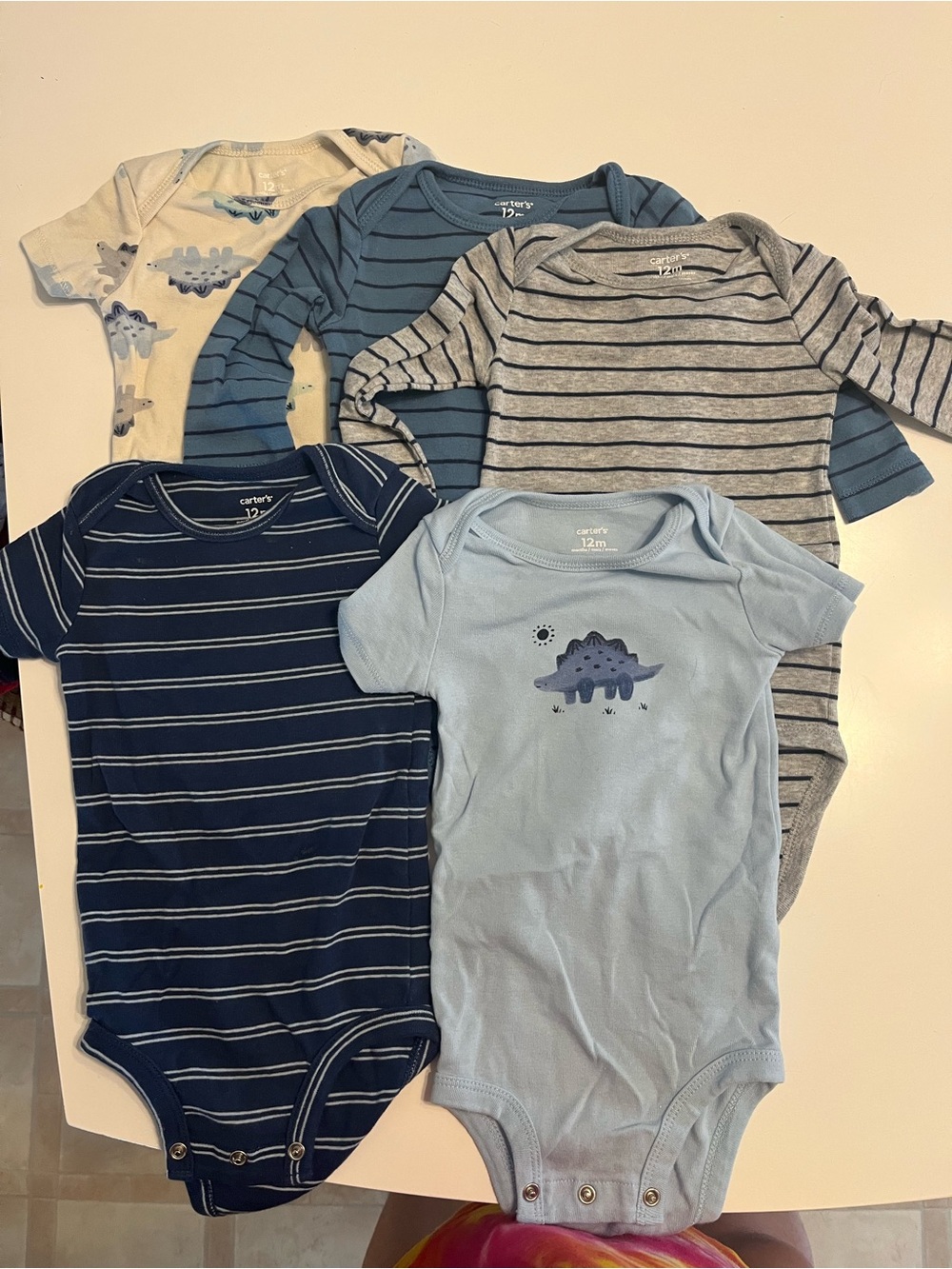 Carter’s bluedinosaur onesie set